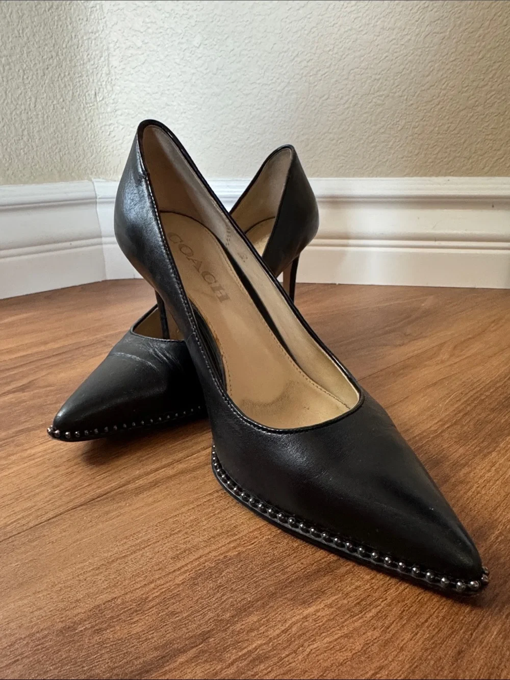Coach Black Leather Pointed-Toe Pumps with Studded Trim